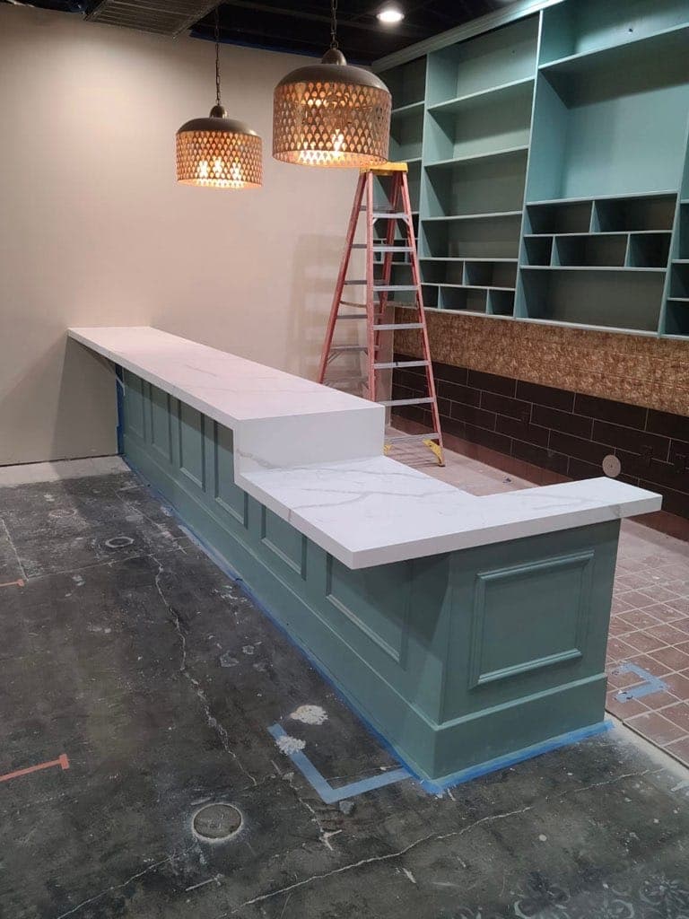 White granite green kitchen